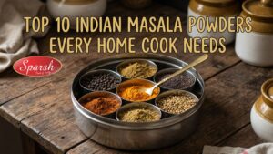 Top 10 Indian masala powders including sambar powder, garam masala, rasam powder, biryani masala, and curry powder arranged in bowls on a wooden surface.