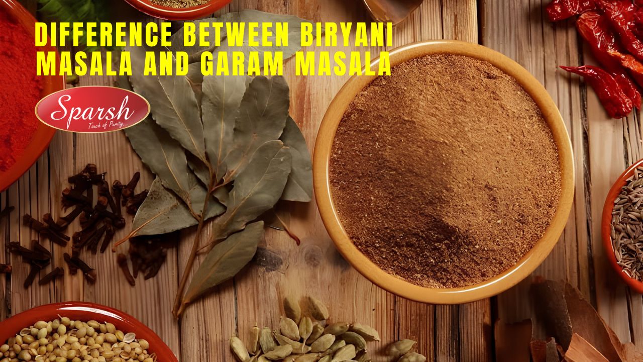 Difference between Biryani Masala and Garam Masala with a bowl of ground spice, whole spices including bay leaves, cloves, cardamom, cumin, red chilies, and Sparsh Masala branding on a wooden background.