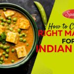 Creamy paneer and peas curry beside text promoting how to choose the right masala for every Indian dish expertly.