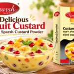 Homemade fruit custard with Sparsh Custard Powder, fresh apple, banana, grapes, mango and pomegranate seeds.